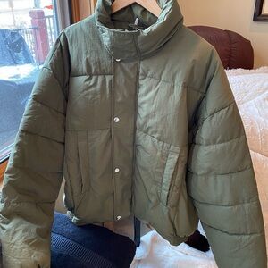 Free People like new lightly used puffer jacket 2 times size L .